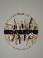 Ring met droogbloemen